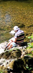 Claude looking for fish in the River Rothy